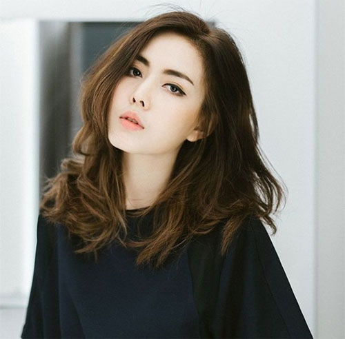 Tóc tỉa layer nữ uốn sóng nước Tóc tỉa layer nữ uốn sóng nước