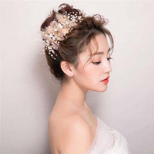 Tóc cô dâu búi cao Tóc cô dâu búi cao