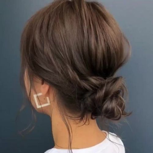 Cách búi tóc xoăn giữ nếp Cách búi tóc xoăn giữ nếp