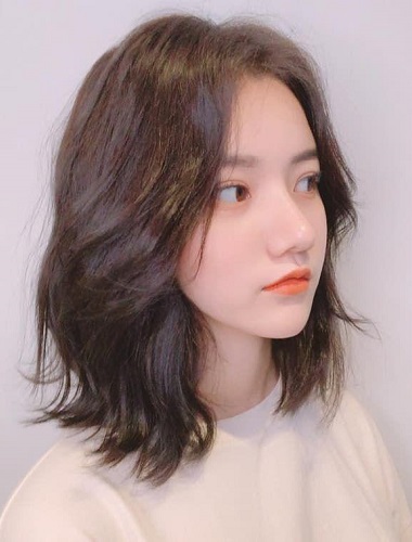 Tóc ngắn tỉa layer xoăn nhẹ