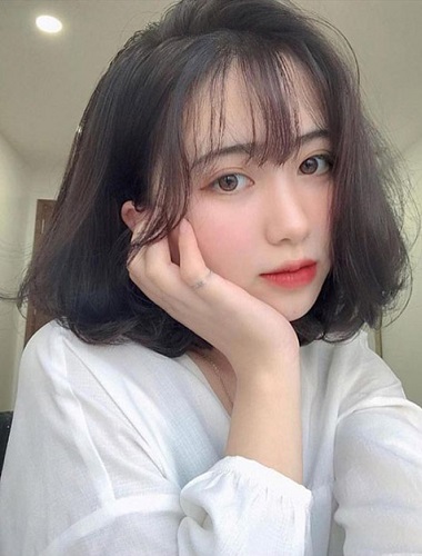 Tóc xoăn ngắn uốn phồng