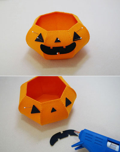 Định hình đôi mắt, mũi, miệng lên giỏ bí ngô Định hình đôi mắt, mũi, miệng lên giỏ bí ngô