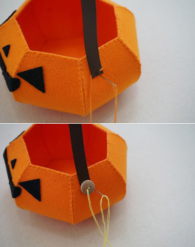 Khâu đoạn dây da làm quai giỏ và khâu thêm hai chiếc cúc áo hai bên quai giỏ Khâu đoạn dây da làm quai giỏ và khâu thêm hai chiếc cúc áo hai bên quai giỏ