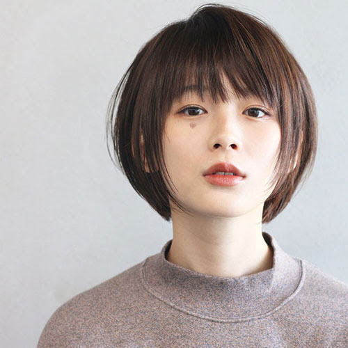 Tóc layer nữ mặt tròn