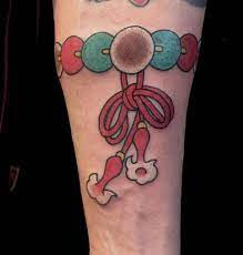 Hình xăm vòng tay chuỗi hạt