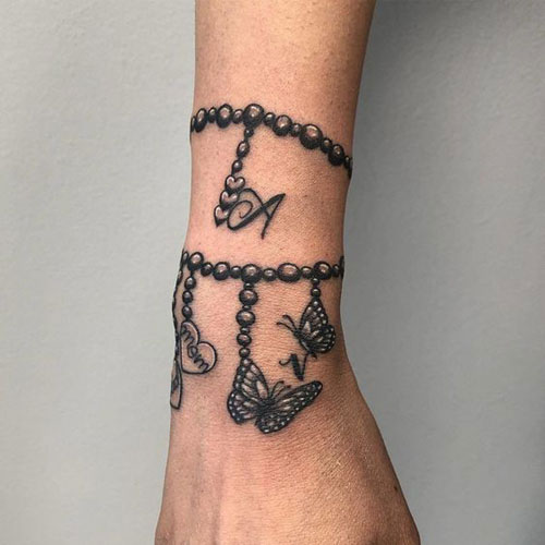 Hình xăm vòng tay chuỗi hạt