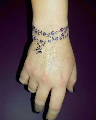 Hình xăm vòng tay chuỗi hạt