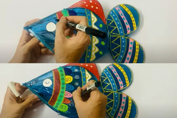 Dùng bút lông đen tô lên đường viền vừa vẽ màu để rõ nét hơn. Bạn có thể vẽ thêm cac họa tiết khác