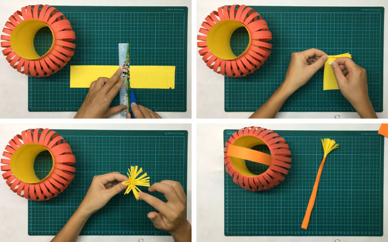 Phần giấy màu còn thừa, bạn cắt tạo thành tua rua, phần đến nến và quai xách cho đèn lồng