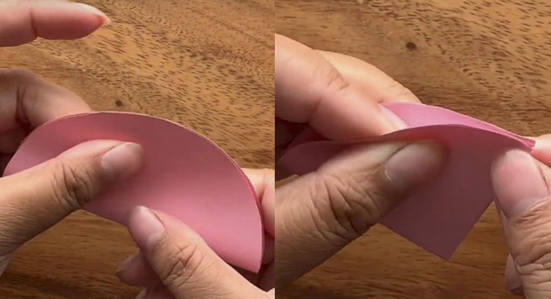 Dùng kéo cắt những hình tròn đó ra rồi gấp đôi hình tròn lại. Từ phần gấp đó, bạn tiếp tục gấp đôi lại thêm một lần nữa