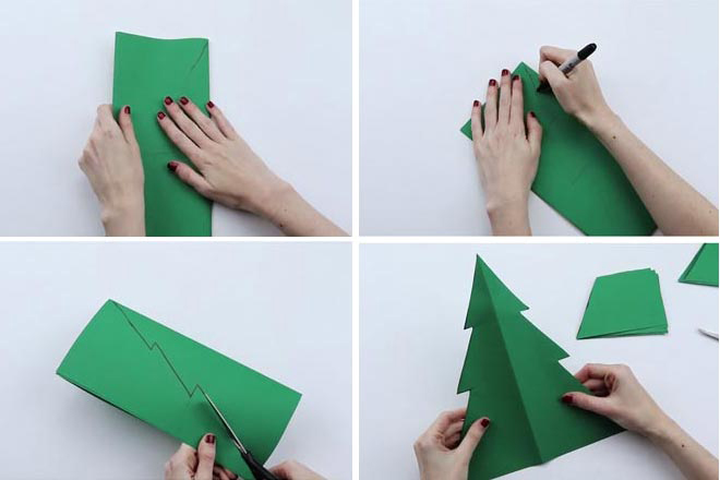 Xếp hai tờ giấy màu cứng chồng lên nhau rồi gấp đôi lại cho đều